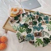 A. 리조트 스타일 셔츠 × 1개