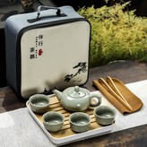 哥窯如意壺和順杯白盤:如圖所示662 × 1個