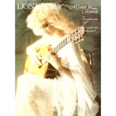 A Guitar for Christmas: Une Guitare Pour Noel/Eine Gitarre Fur Weihnachten Paperback, Hal Leonard Publishing Corporation