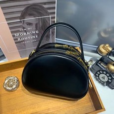 즐쇼핑 가죽 라운드 투지퍼 미니 크로스백 ESA0979