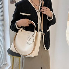 라운드 베어 크로스 스트랩 숄더백