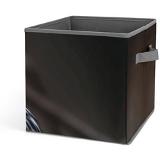 옷 담요 장난감을 정리할 수 있는 이중 손잡이 바구니가 대용량 패브릭 보관함 큐브 정리함 위에 앉은 오이니에 새