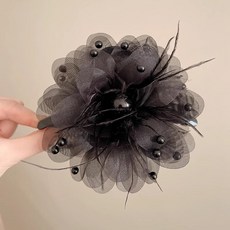黑色花朵羽毛抓夾