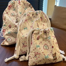 新款泡泡棉女學生可愛化妝包卡通抽繩雜物收納袋手拎零錢包