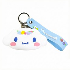 귀여운 케릭터 얼굴 디자인에 손목스트랩 끈이 달려있는 시나모롤 동전지갑