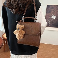 투니스 여성 심플 백팩 펜던트 포함