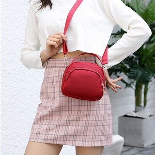 Elsso 手機手搖鈴貝殼尼龍迷你包