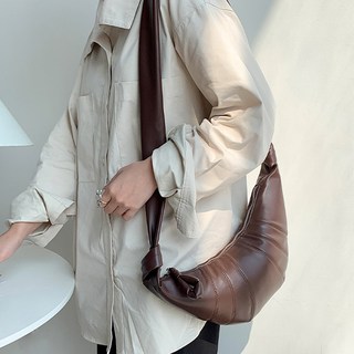 Besni 牛角包造型流浪斜肩包