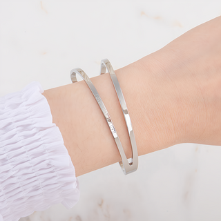 RADIANT STAR 璀璨之星 鈦鋼 布拉格戀人流線鏤空手鐲 KTL379