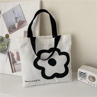 日系化妝帆布包女包新款潮韓版百搭印花雲朵手提包少女上班小布包