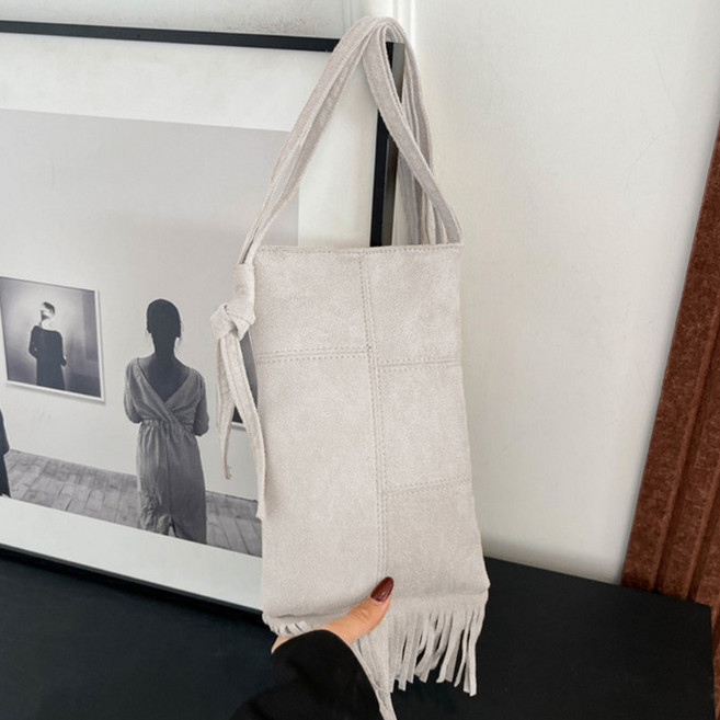 알로데 태슬 포인트 모조 스웨이드 가방