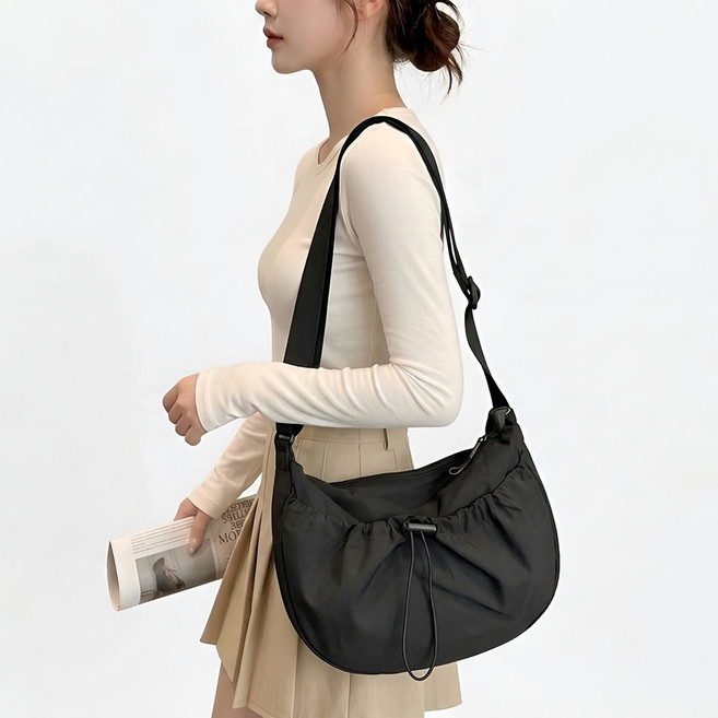 미쓰백 도로시 나일론 스트링 셔링 크로스백