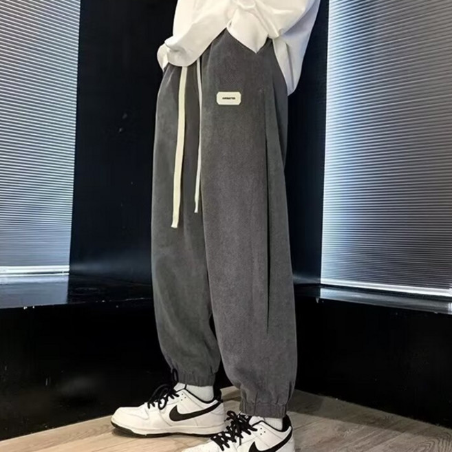 JTL 男款動畫休閒舒適束口褲