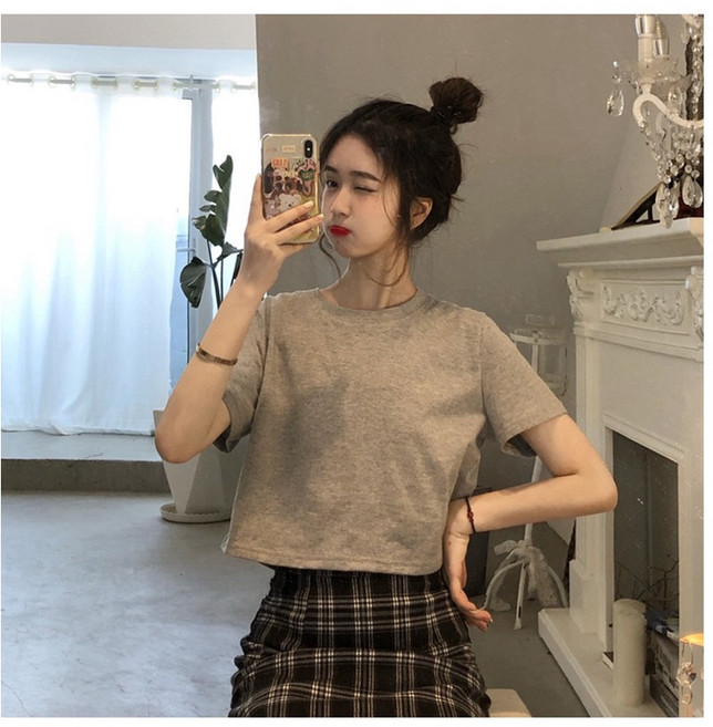 短版露肚臍素色寬鬆圓領短袖女裝上衣