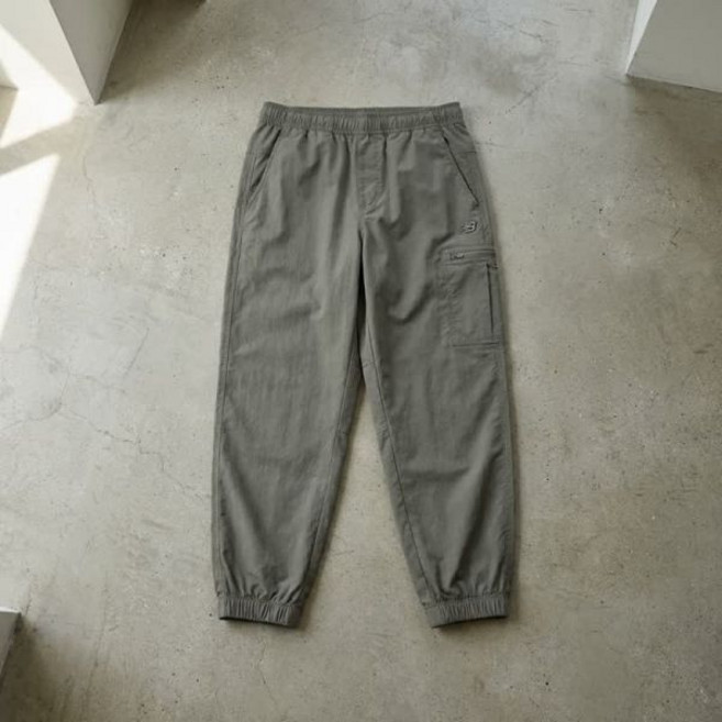 뉴발란스 NBNTG21333 남녀공용 에센셜 스트레치 우븐 조거 바지 팬츠 KHAKI GI
