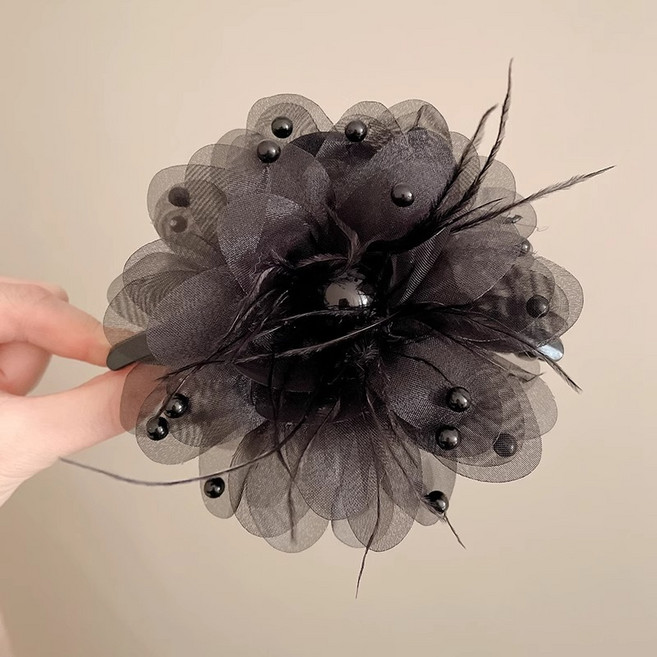 黑色花朵羽毛抓夾