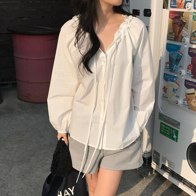 페트리코어 벨라 루즈핏 프릴 스트링 블라우스