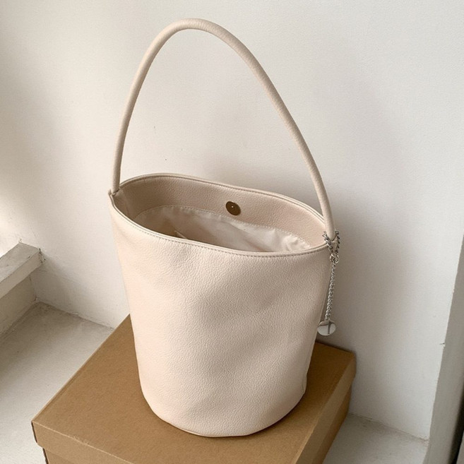 와이엔이 원통형 심플 버킷백 숄더백