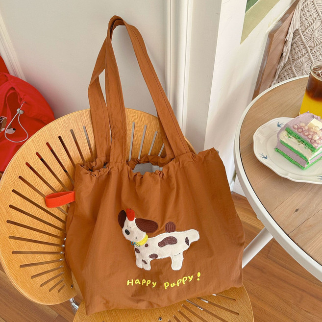 2026新款刺绣卡通帆布包韩版学院风休闲慵懒风托特包大容量购物袋