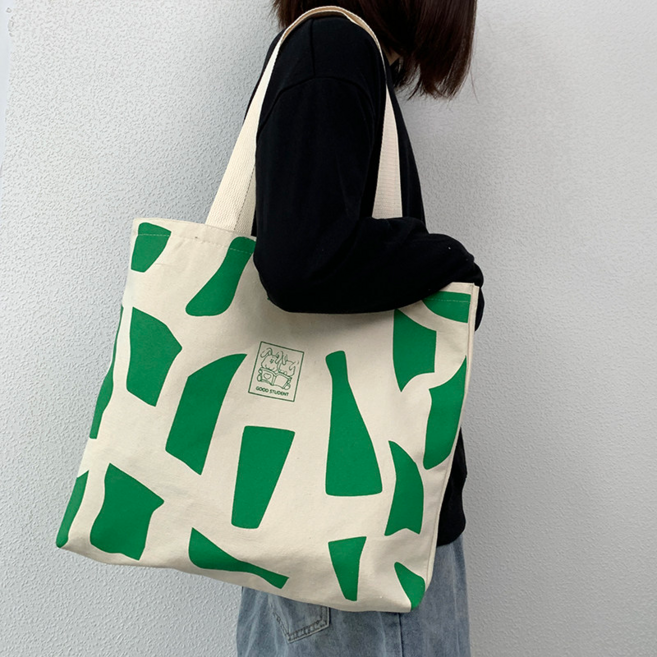 通勤大容量單肩帆布包 男女學生上課裝書手提袋