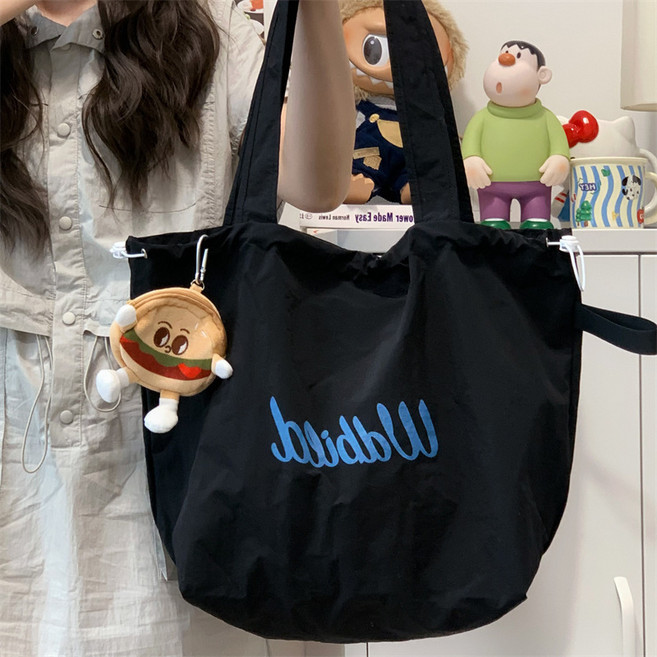 新款鬆弛感帆布包托特包包女抽繩通勤輕便手提袋文藝大容量單肩包