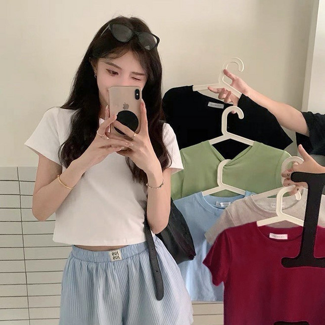 《杜達女孩》女孩的微短版上衣 純棉短版素T 露肚T