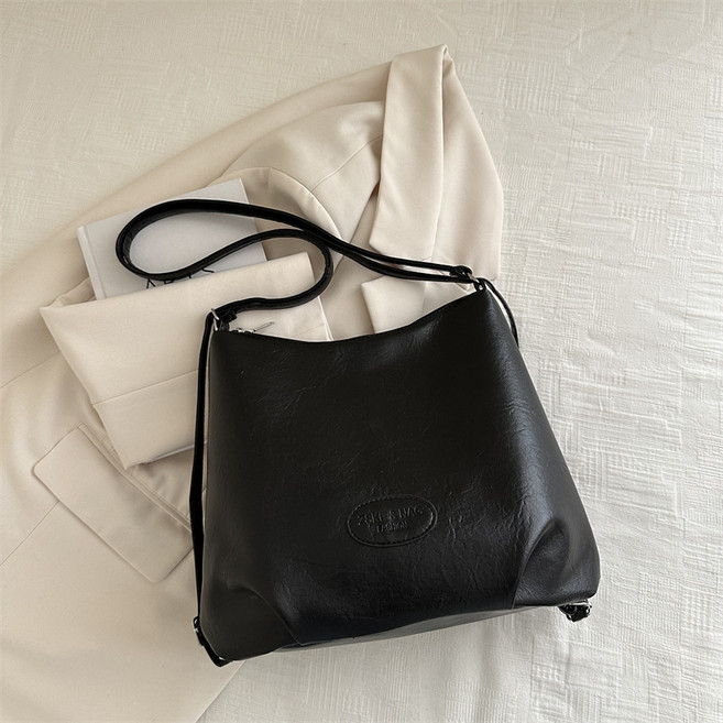 大容量通勤流行休閒復古新款純色潮流多功能斜挎單肩托特女包