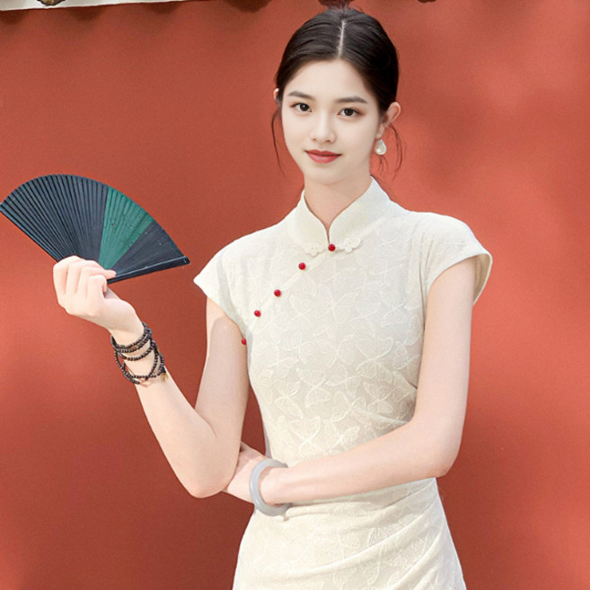 2026夏新款訂婚國風新中式針織顯瘦連衣裙溫言蝴蝶提花改良旗袍女