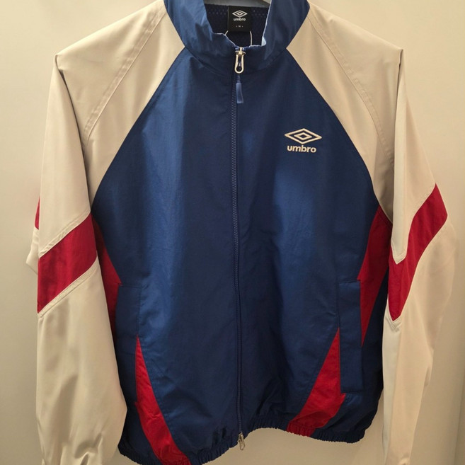 UR123CJK14 (국내백화점판) UMBRO 엄브로 25년 남녀공용 팝러쉬 기모 바람막이 자켓